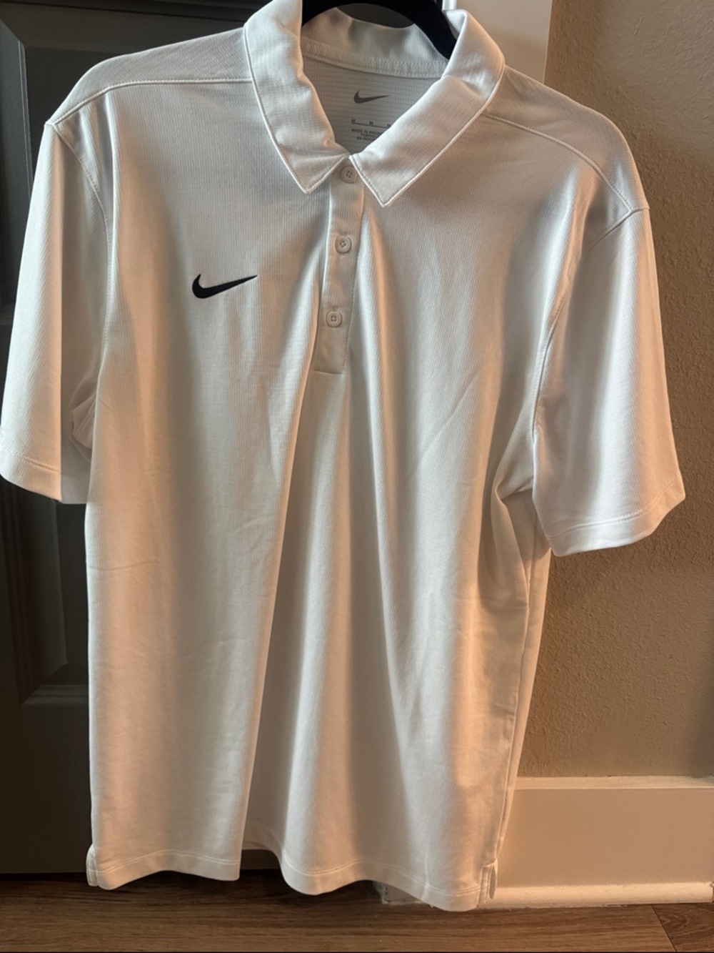 Nike White Polo Shirt with Black Swoosh